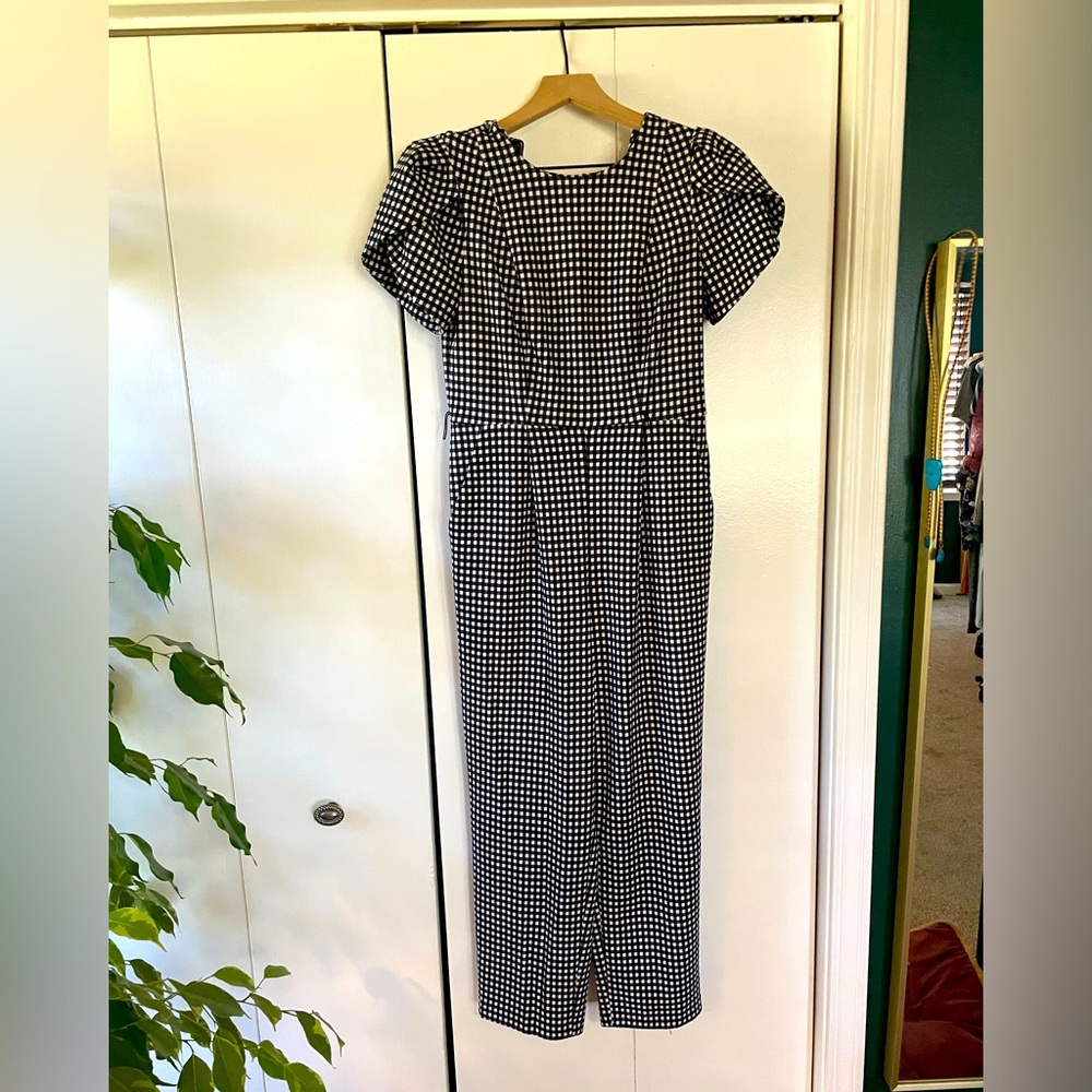 Calvin Klein jumpsuit, size: 4. Very classy. Stretchy Material.